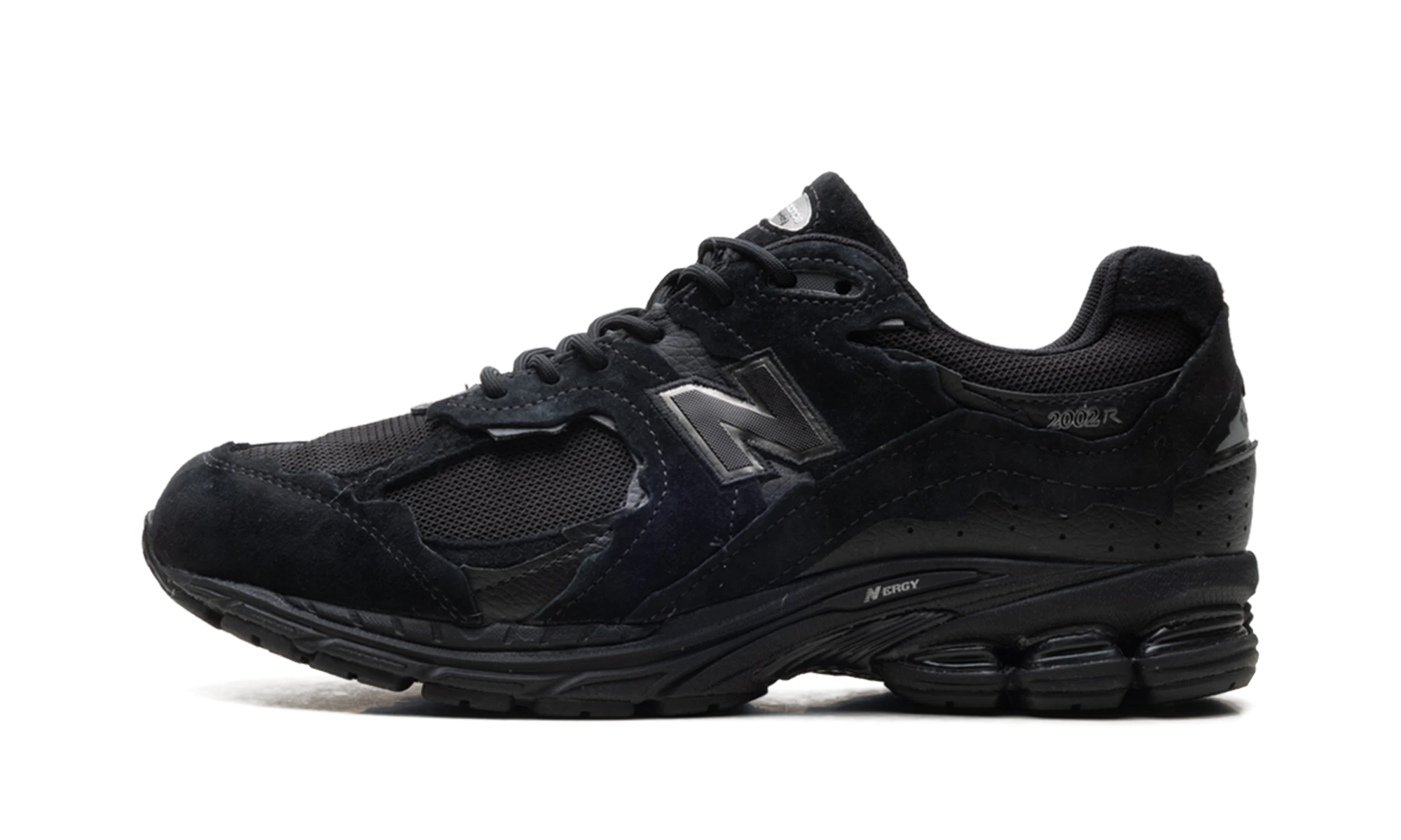 Sneaker New Balance 2002R Protection Pack Black (U2002DXB) in leather black — outer profile view.