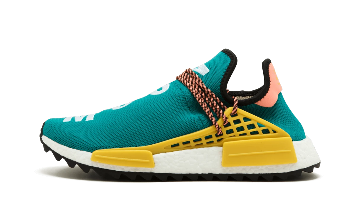 Sneaker Adidas Human Race NMD Pharrell Sun Glow (AC7188) in leather black and yellow — outer profile view.
