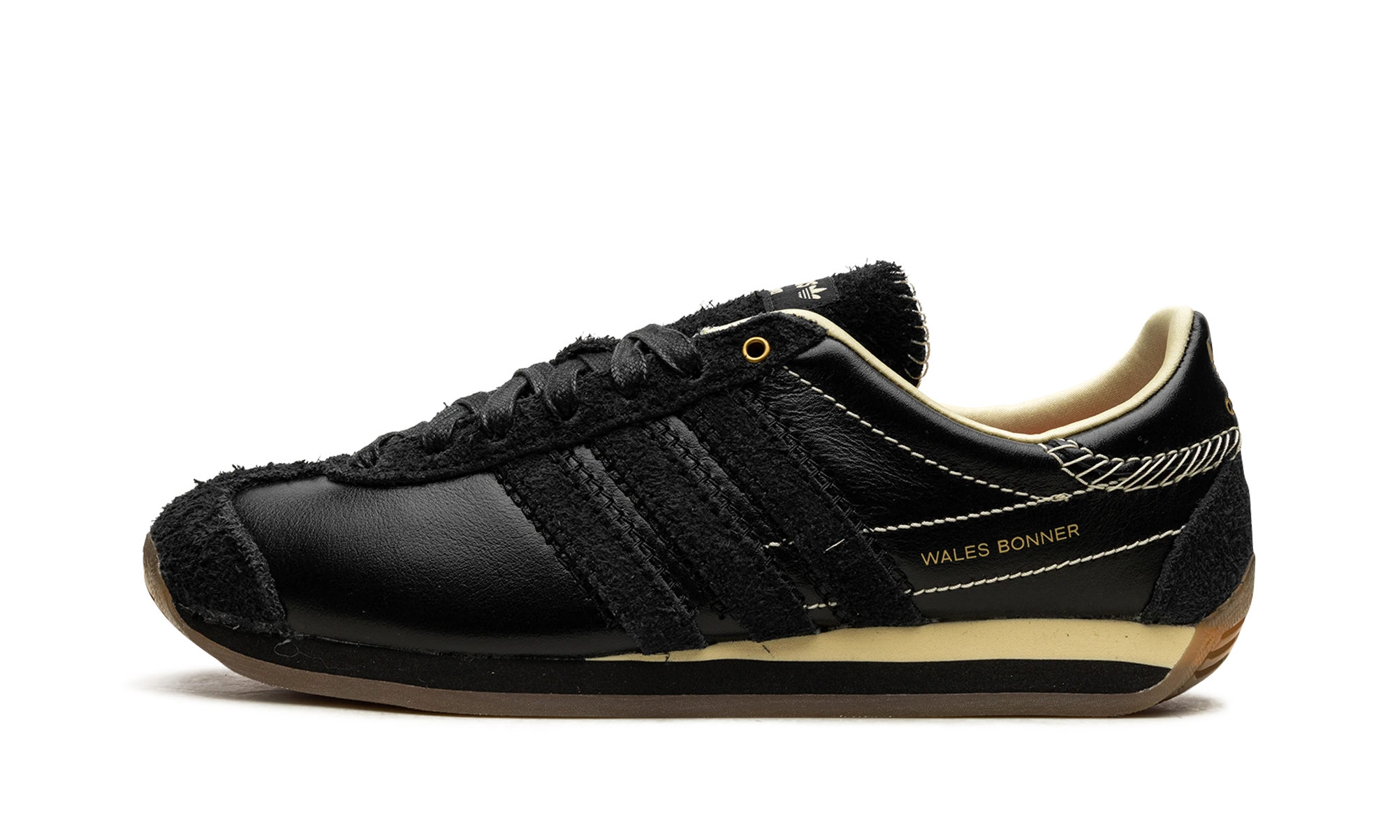 Sneaker Adidas Originals Country Wales Bonner Black (GY1702) in leather black and yellow — outer profile view.