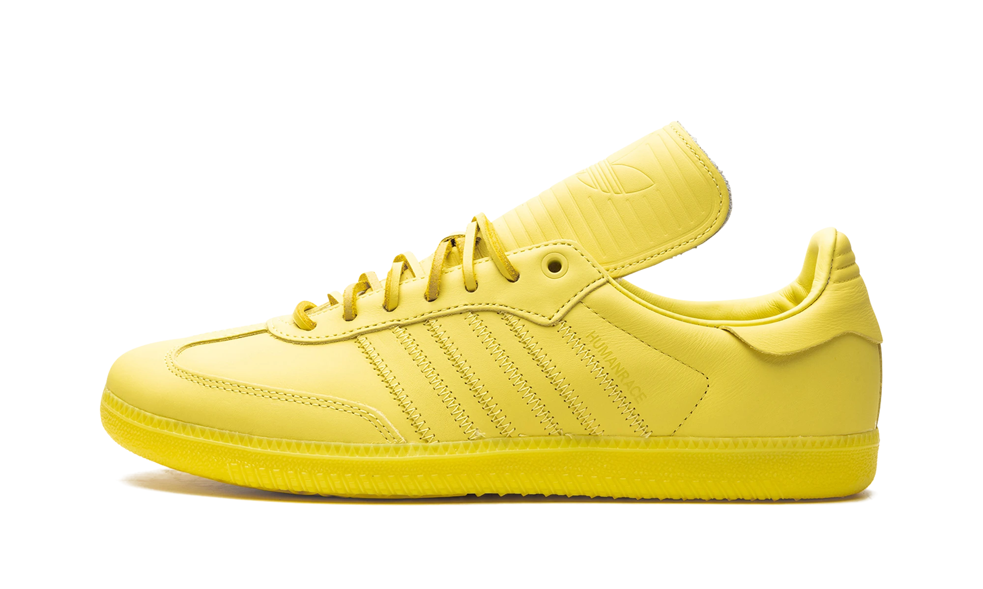Detail of the inner side of the sneaker Adidas Samba Pharrell Humanrace Yellow jaune.