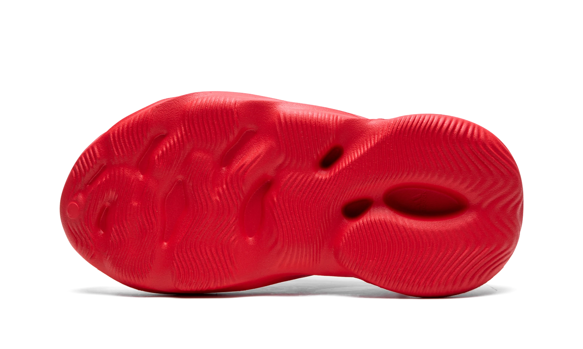 Outer rubber sole of the Adidas Yeezy Foam RNR Vermillion (GW3355).