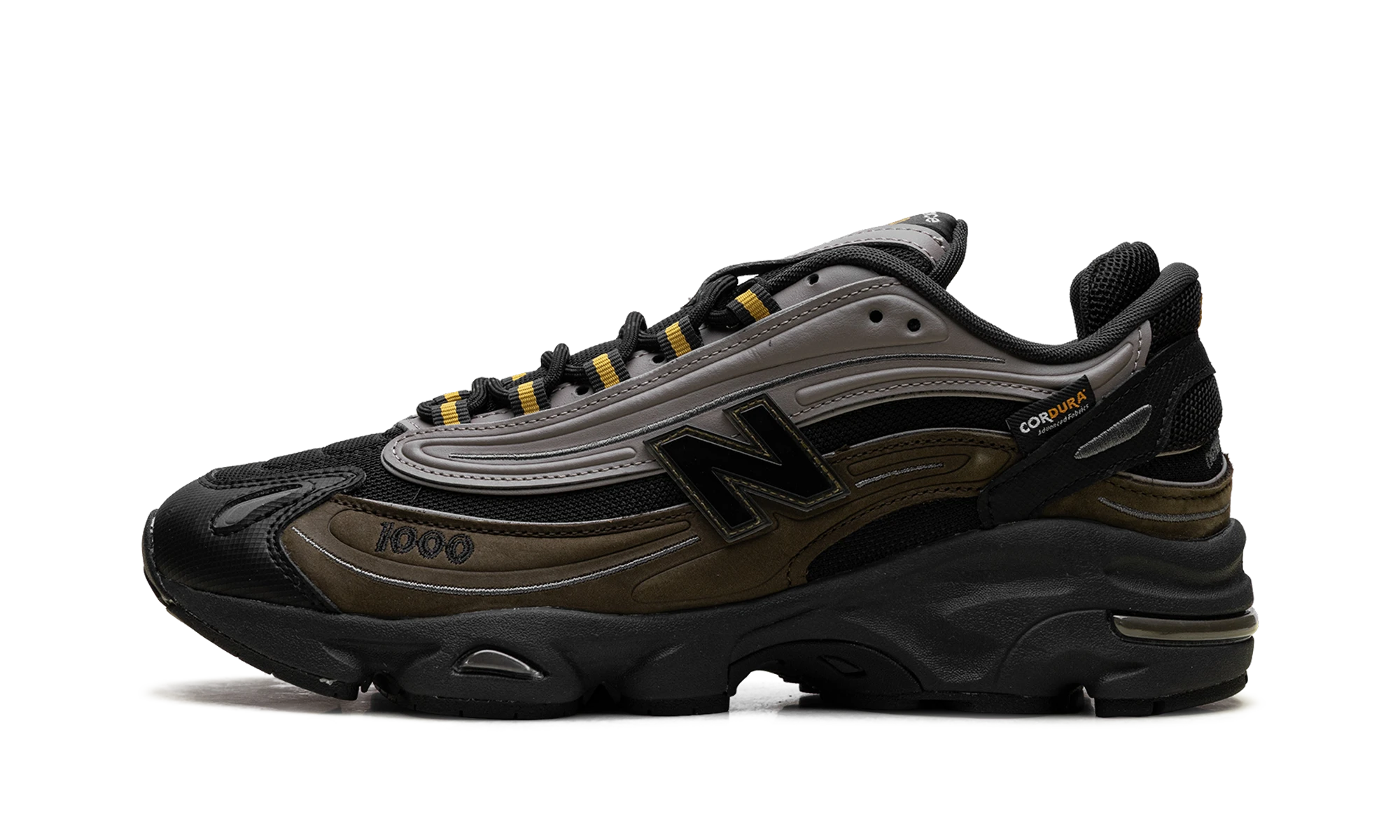 Sneaker New Balance 1000 Cordura Woodland Baroque Gold (M1000L) in leather gold and black — outer profile view.