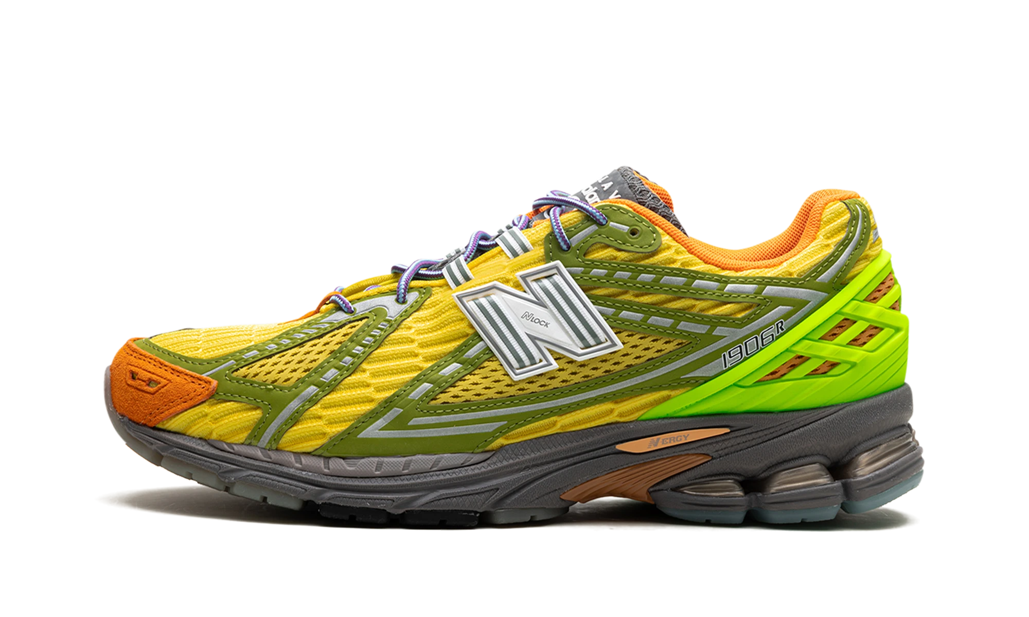 Sneaker New Balance 1906R Action Bronson Scorpius in leather yellow and orange, available in Europe — outer profile view.