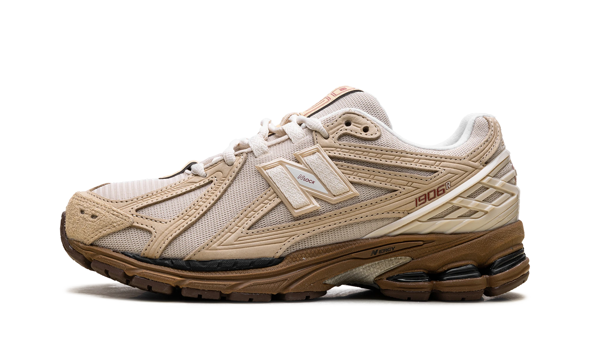Sneaker New Balance 1906R Randomevent The Sweetness of Kin in leather beige and brown, available in Europe — outer profile view.