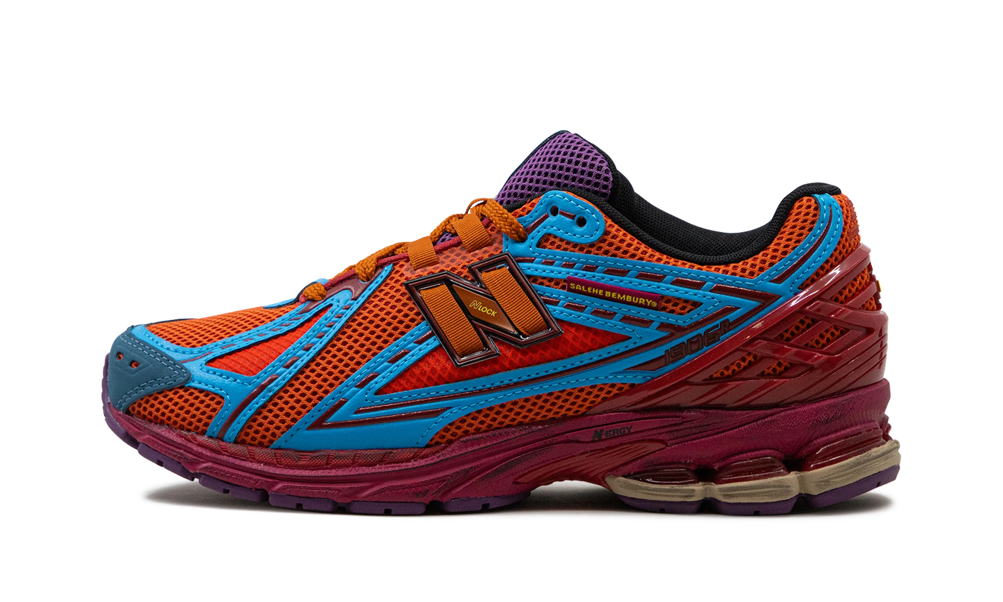 Sneaker New Balance 1906R Salehe Bembury Heat Be Hot Magma in leather orange, red and blue, available in Europe — outer profile view.