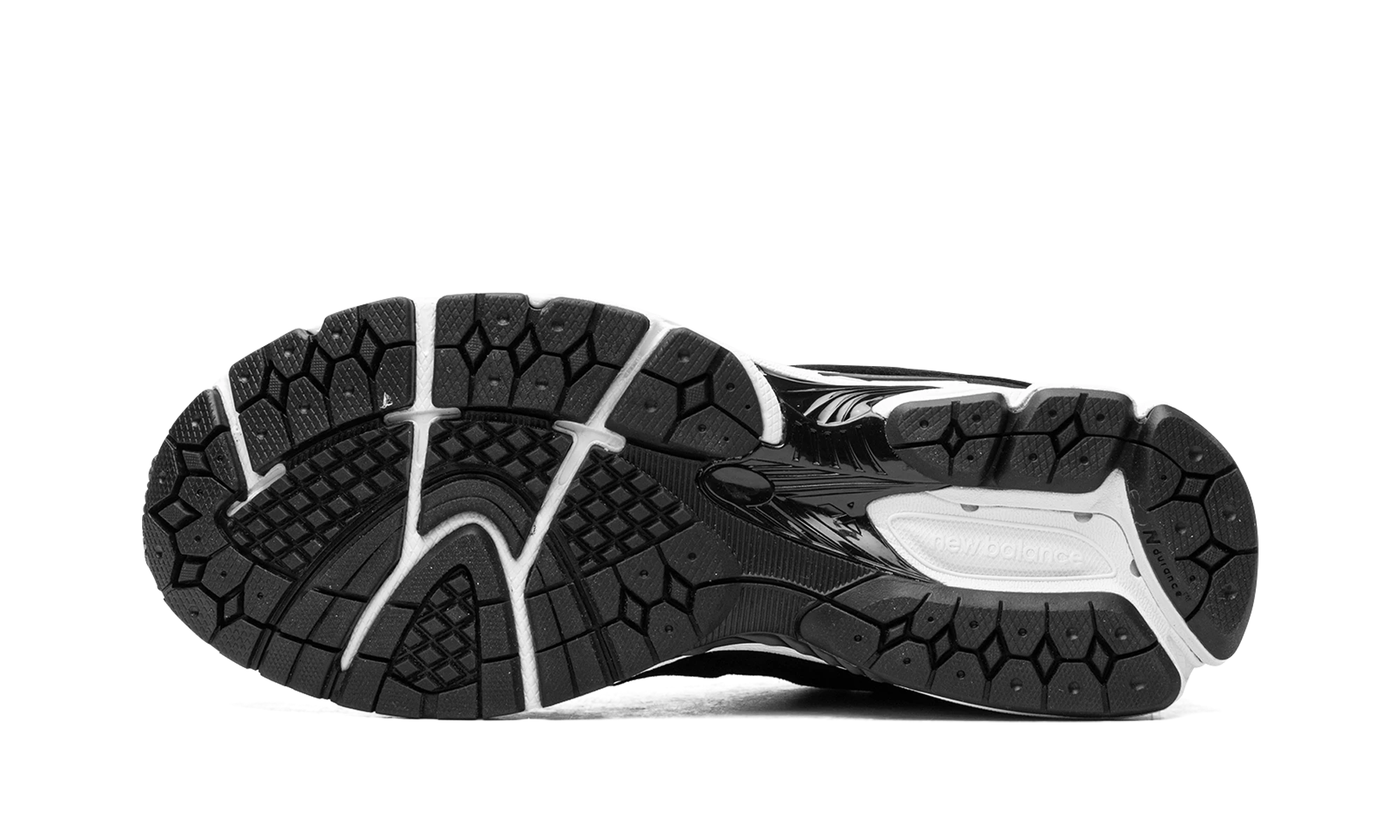 Outer rubber sole of the New Balance 2002R Black Gunmetal (M2002RBK).