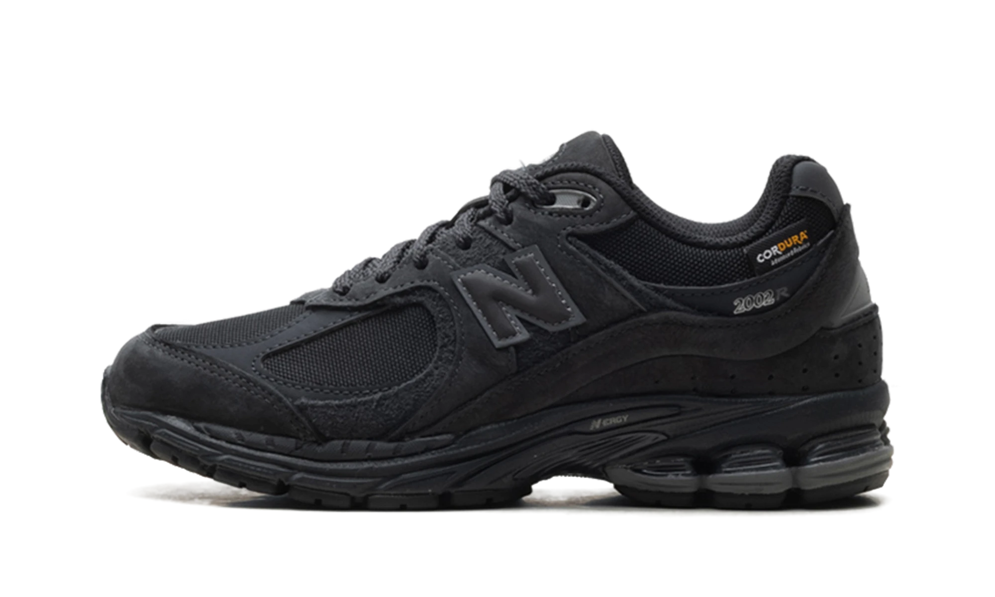 Sneaker New Balance 2002R Cordura Phantom Black (M2002RPJ) in leather black — outer profile view.