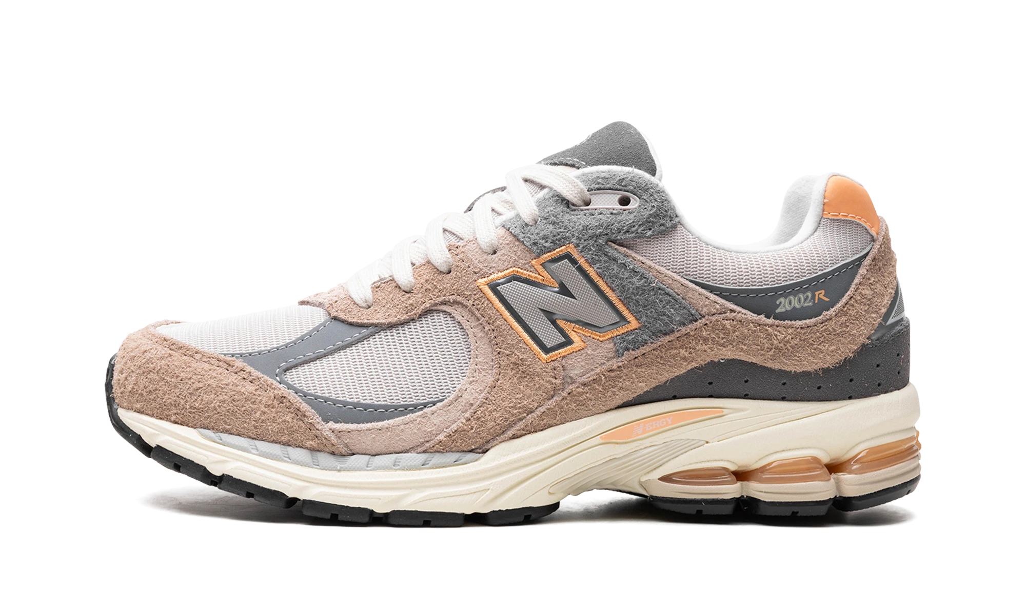 Sneaker New Balance 2002R Mushroom Hazy Peach (M2002REJ) in leather beige and pink — outer profile view.