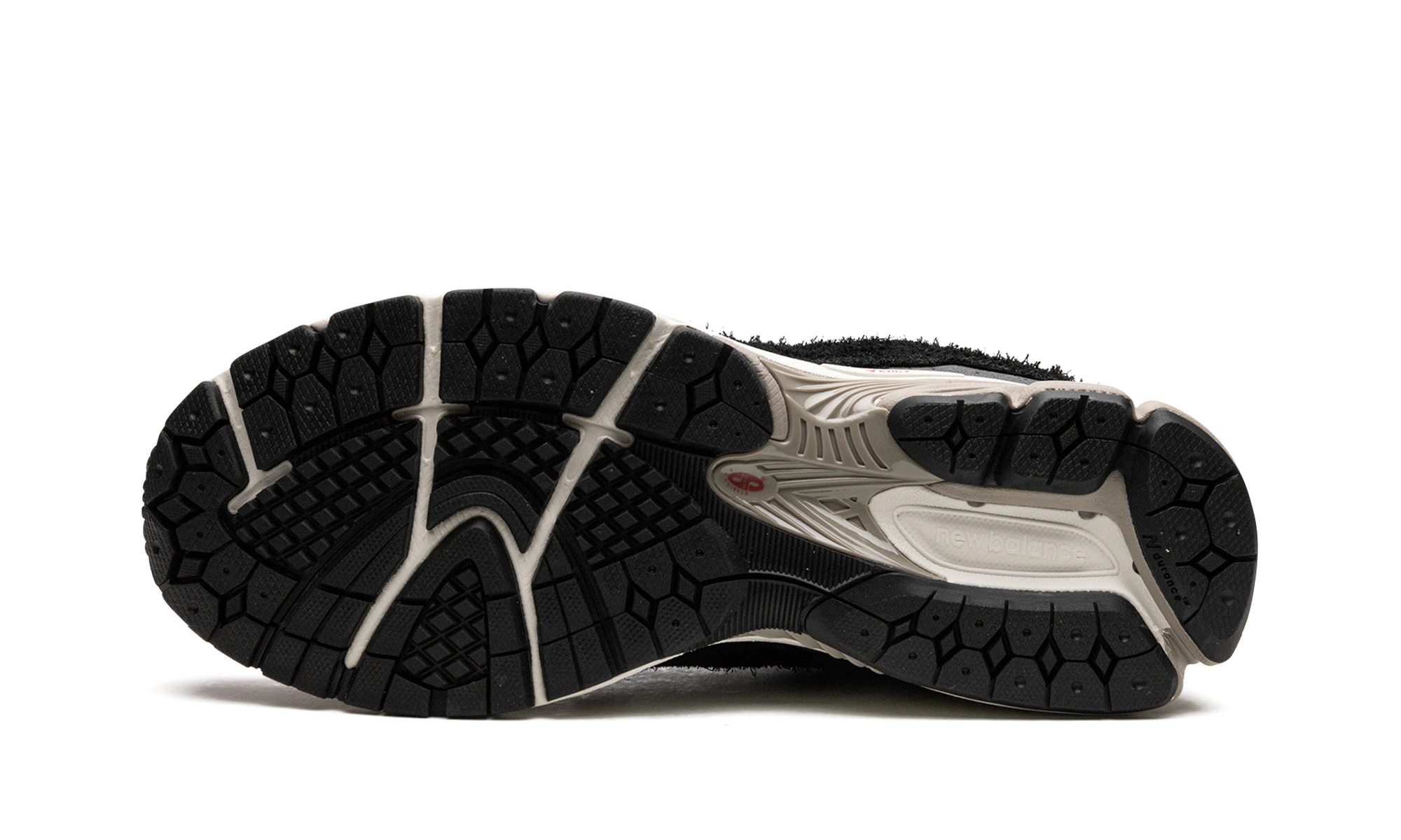 Outer rubber sole of the New Balance 2002R Protection Pack Black Grey (M2002RDJ).