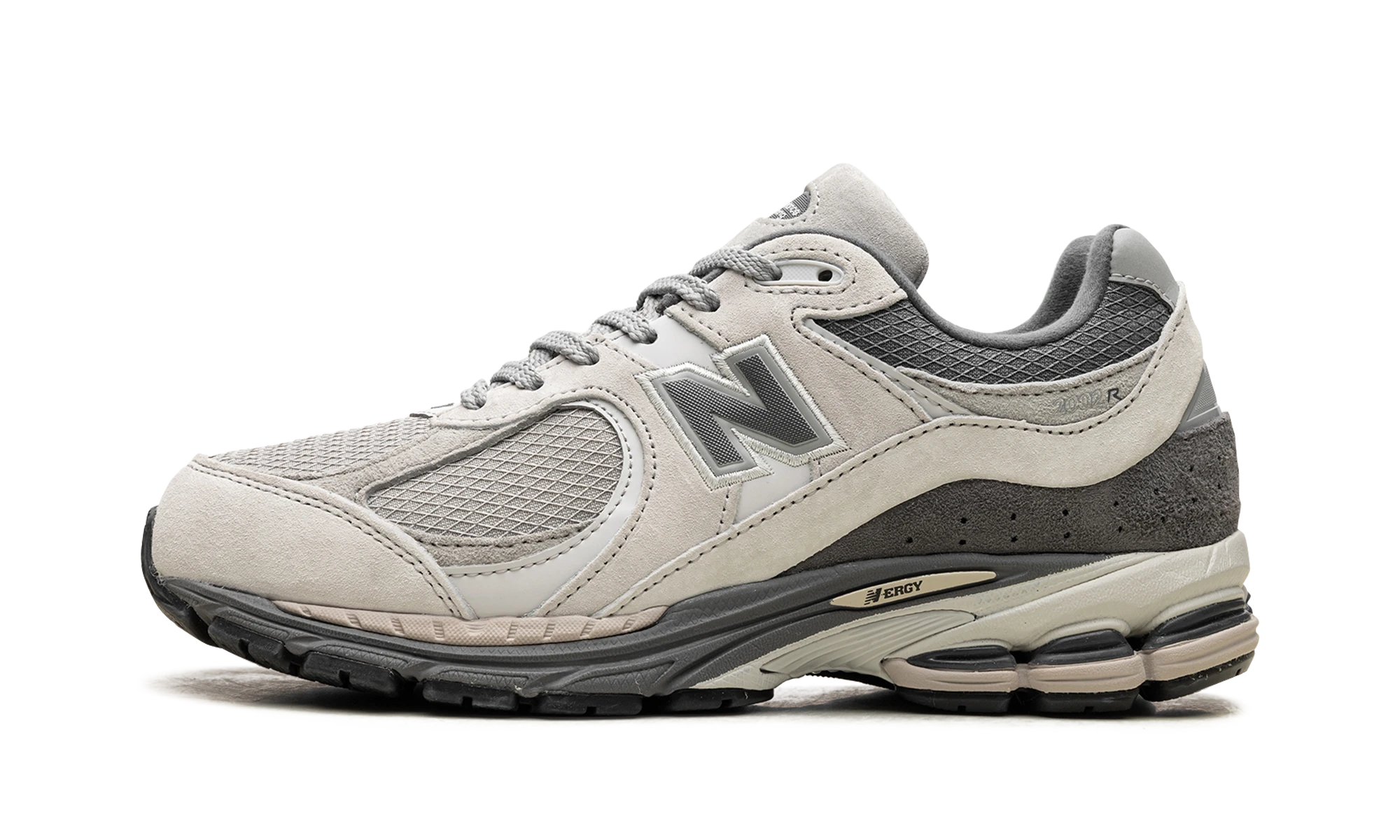 Sneaker New Balance 2002R Raincloud Concrete (M2002RRW) in leather — outer profile view.
