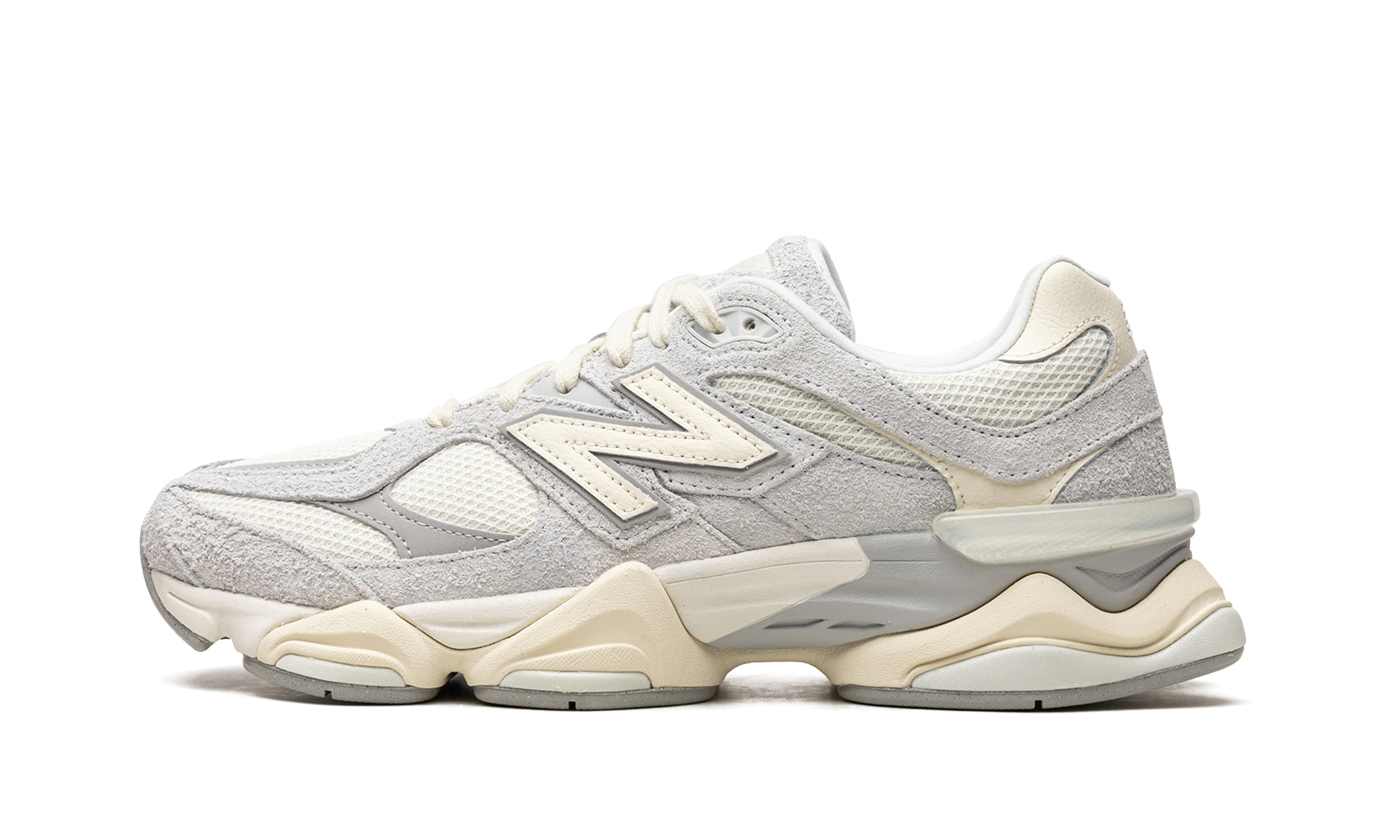 Sneaker New Balance 9060 Quartz Grey (U9060HSA) in leer grijs, beige en wit — zijaanzicht.