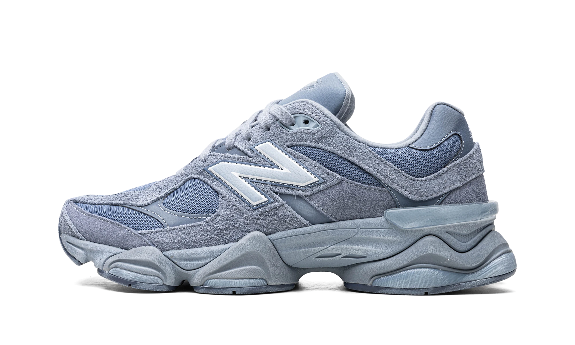 Sneaker New Balance 9060 Vintage Indigo (U9060IB) in leer grijs en blauw — zijaanzicht.