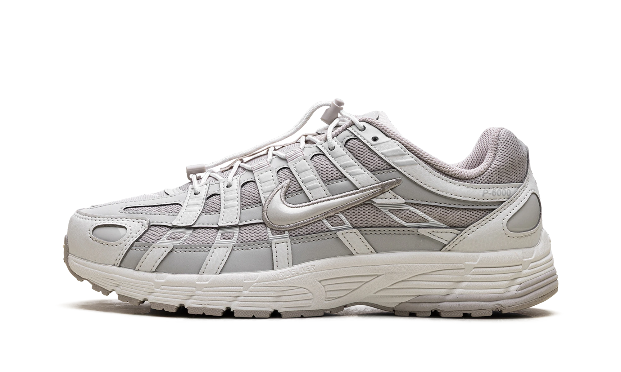 Sneaker Nike P-6000 Sail Light Bone Cream in leather beige, available in Europe — outer profile view.