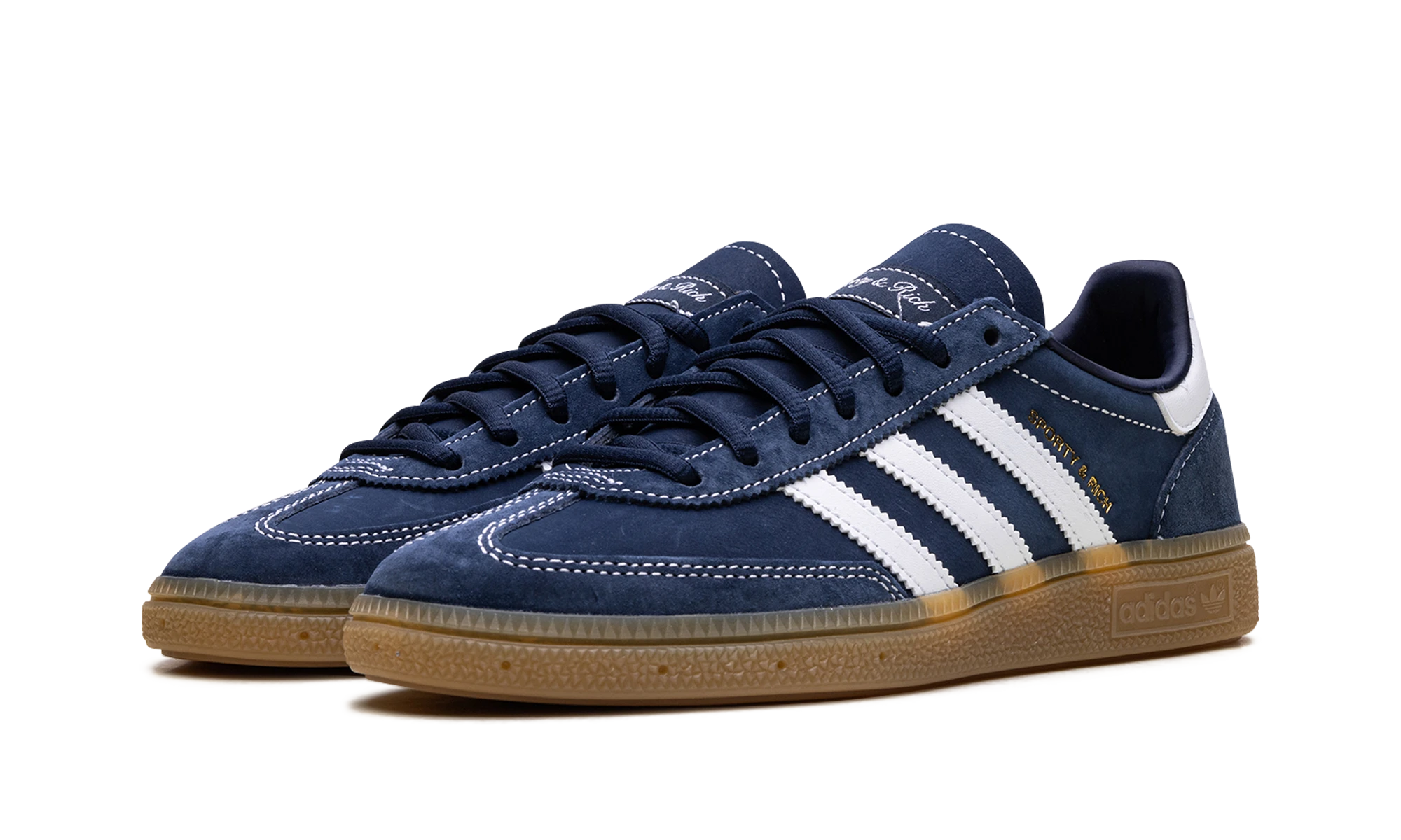Detail of the inner side of the sneaker Adidas Handball Spezial Sporty & Rich Night Indigo (JP7066) bleu, blanc et marron.