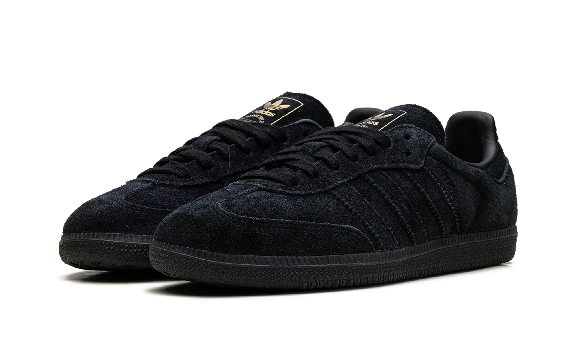 Dettaglio del lato interno della scarpa Adidas Samba OG Core Black Gold Metallic (JR0887) noir, gris et or.