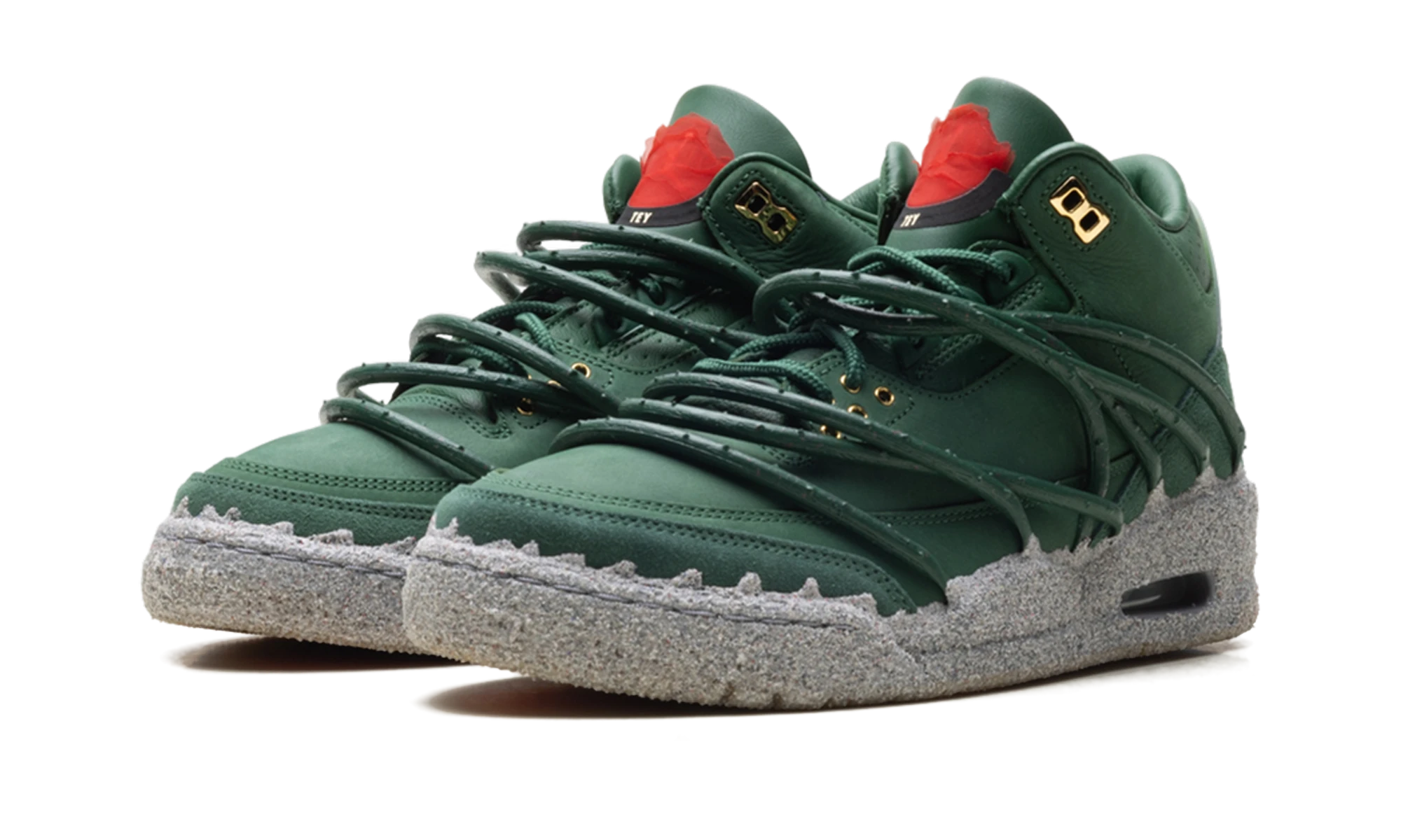 Detail of the inner side of the sneaker Air Jordan Jordan 3 Retro Teyana Taylor Concrete Rose (IF3097-300) rouge, vert et gris.