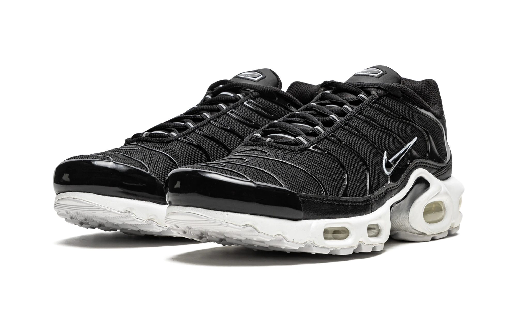 Detail of the inner side of the sneaker Nike Air Max Plus Black White (DM2362-001) noir et blanc.
