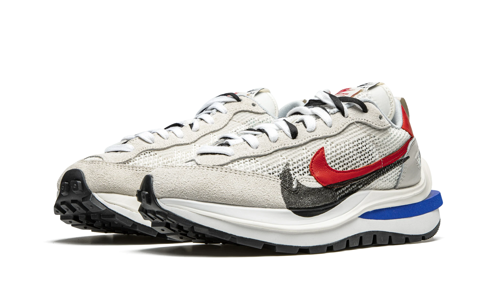 Detalj av insidan av sneaker Nike Vaporwaffle sacai Sport Fuchsia Game Royal (CV1363-100) beige, rose et bleu.