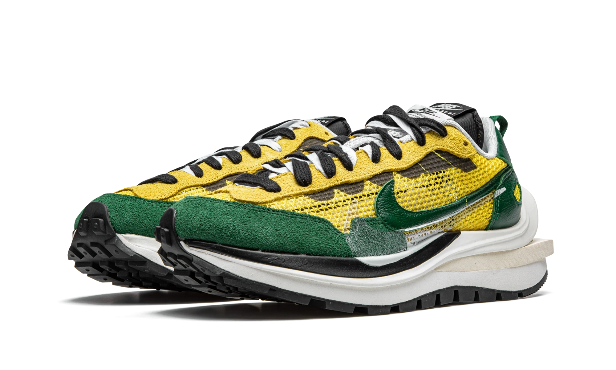 Detalj av insidan av sneaker Nike Vaporwaffle sacai Tour Yellow Stadium Green (CV1363-700) jaune, vert et beige.