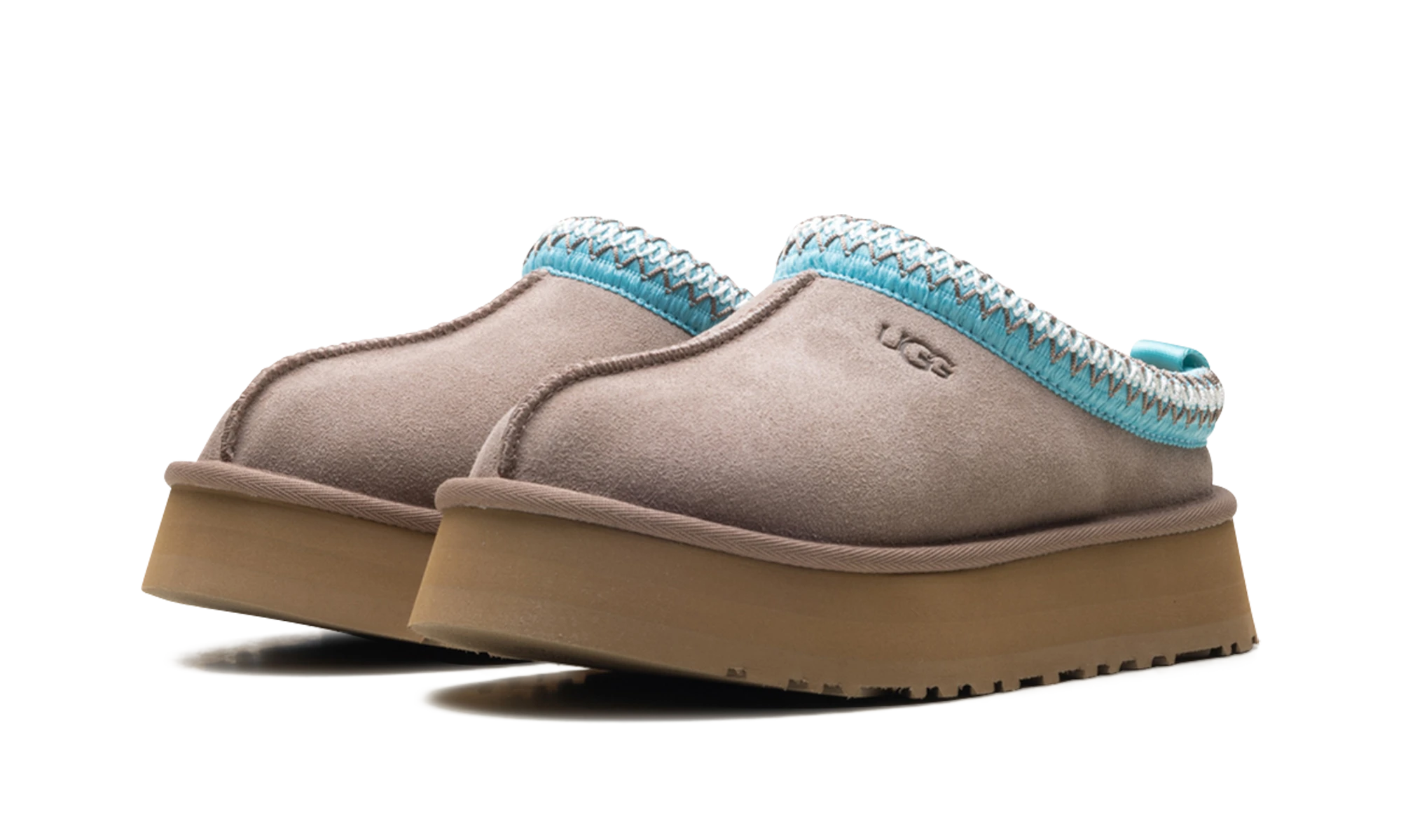 Detail of the inner side of the slipper UGG Tazz II Slipper Caribou Sapphire Ice bleu.